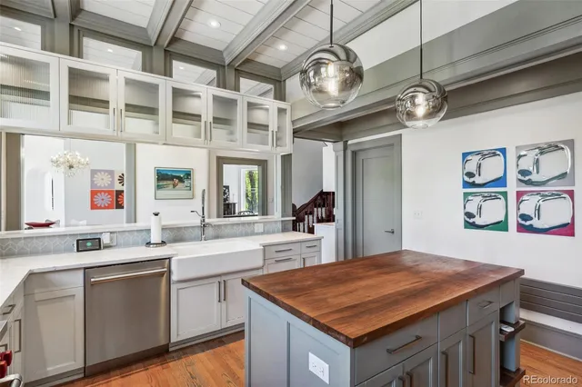 a kitchen with a counter space cabinets and stainless steel appliances