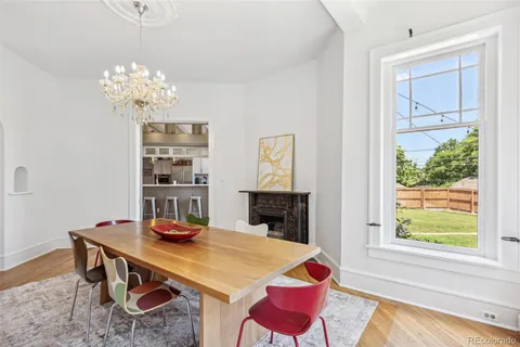 a view of a dining room with furniture window and outside view
