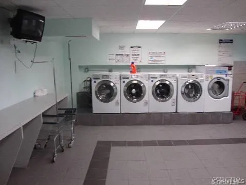a white refrigerator freezer sitting inside of a kitchen