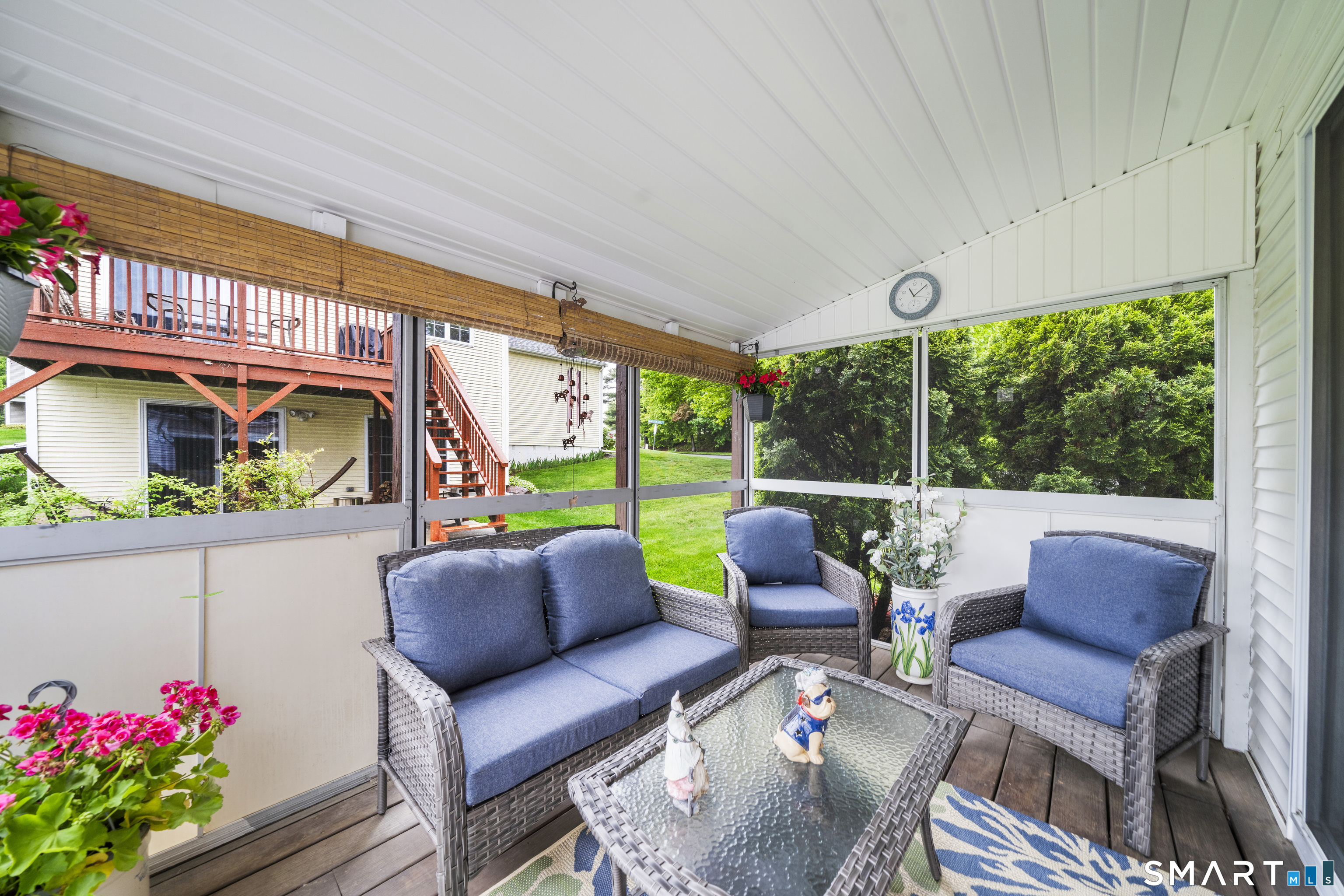 7 Heather Lane, Unit 7 Suffield, CT 06078 - Photo 26 of 34 a balcony with furniture and a potted plant