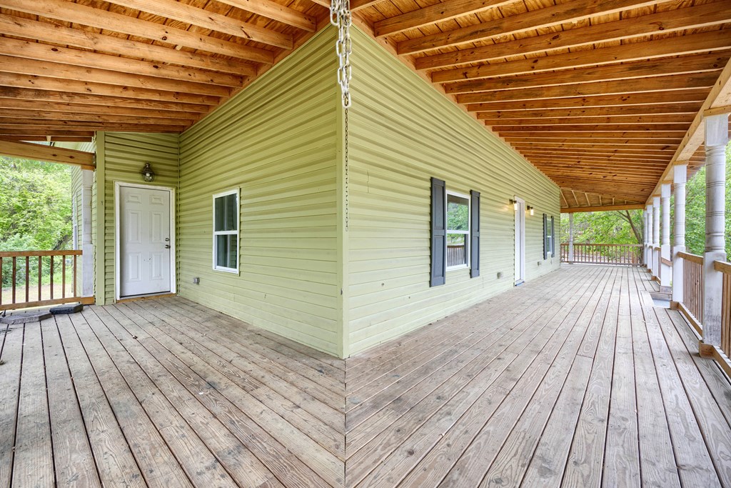 2113 Summerville Road Phenix City, AL 36867 - Photo 9 of 37 a view of backyard with a wooden deck