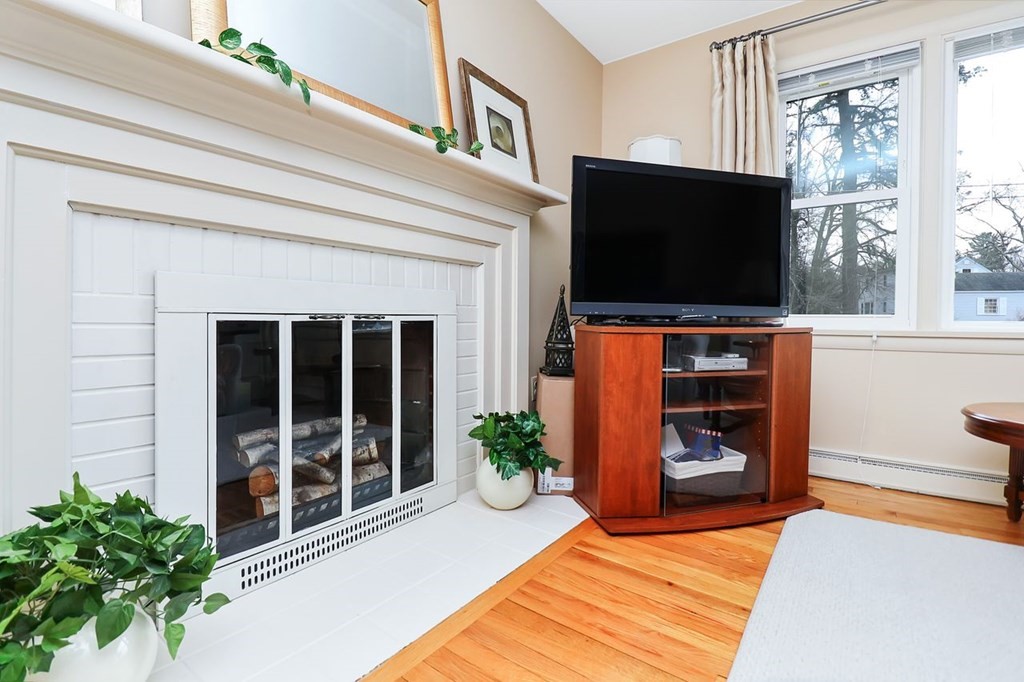 5 Fox Hill Road Springfield, MA 01118 - Photo 5 of 35 a living room with furniture and a flat screen tv
