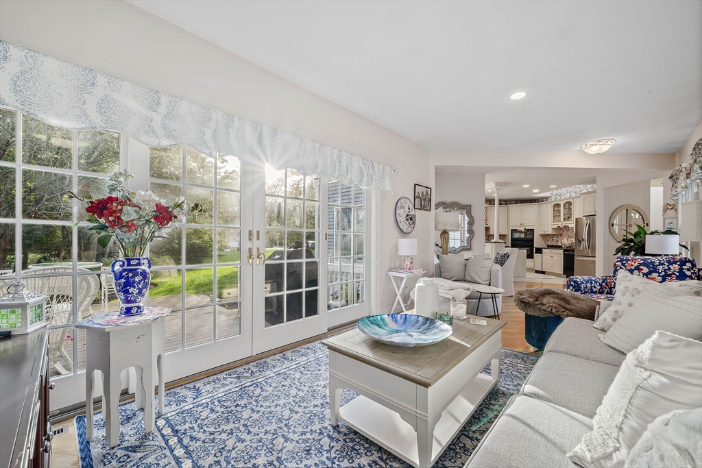 11 Forest Lane, Unit 11 Scituate, MA 02066 - Photo 12 of 42 a living room with furniture and a potted plant