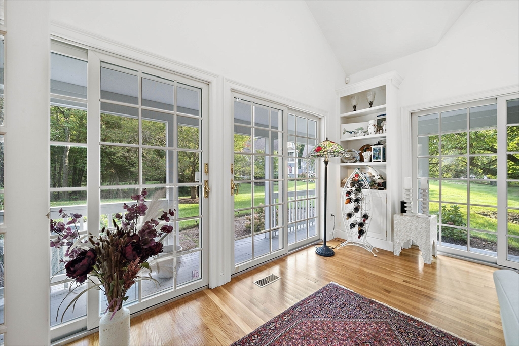 11 Forest Lane, Unit 11 Scituate, MA 02066 - Photo 18 of 42 a living room with furniture and a potted plant