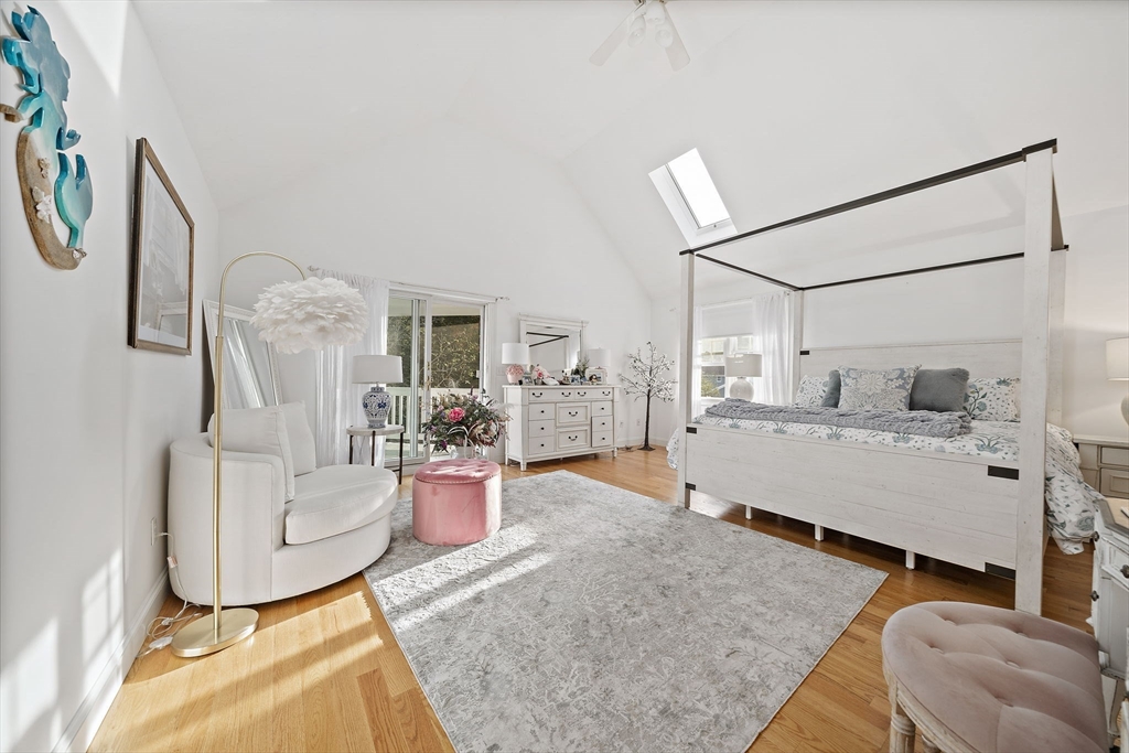 11 Forest Lane, Unit 11 Scituate, MA 02066 - Photo 25 of 42 a living room with furniture and wooden floor