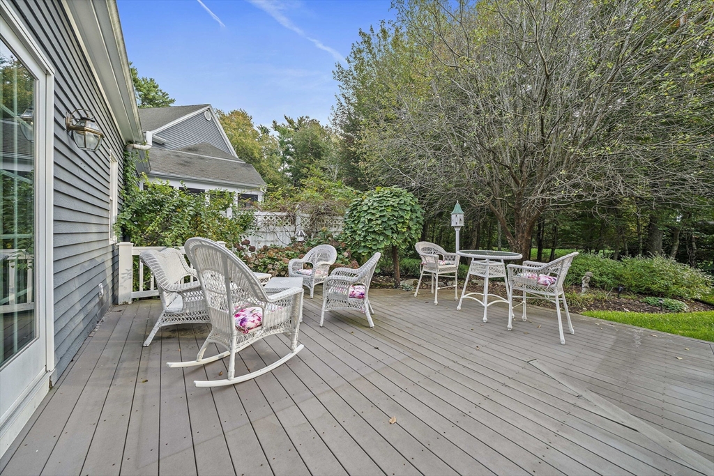 11 Forest Lane, Unit 11 Scituate, MA 02066 - Photo 35 of 42 a view of a chairs and table on the wooden deck