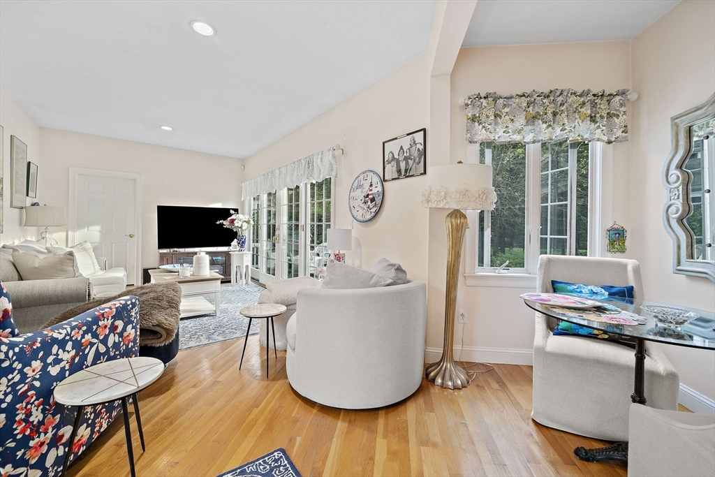 11 Forest Lane, Unit 11 Scituate, MA 02066 - Photo 10 of 42 a living room with furniture and a flat screen tv