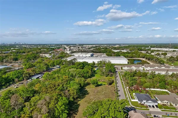 an aerial view of residential building with parking space