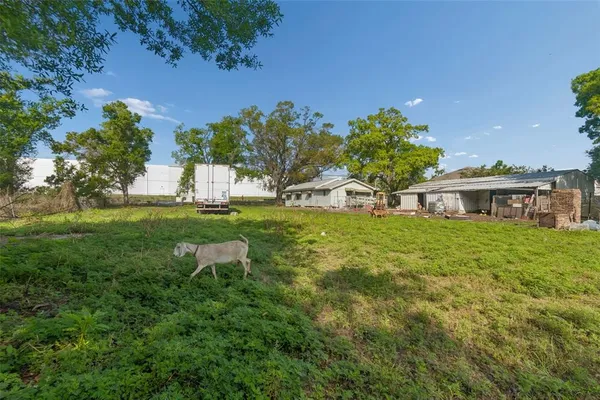 a view of an outdoor space and a yard