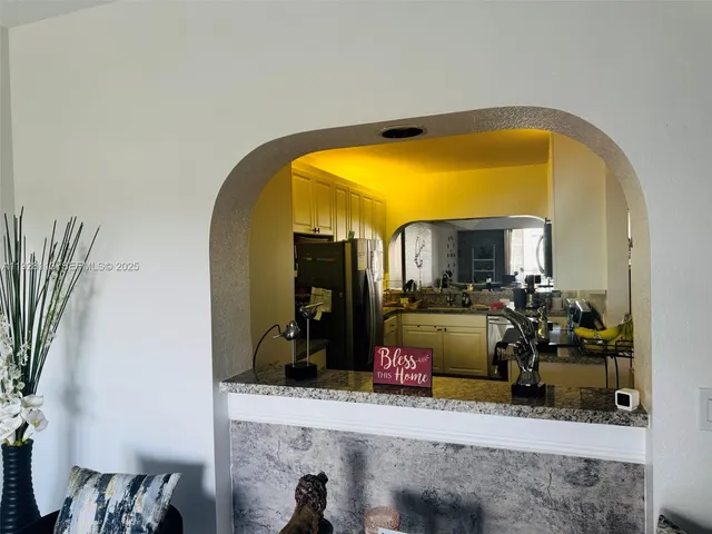 a view of a living room with a mirror