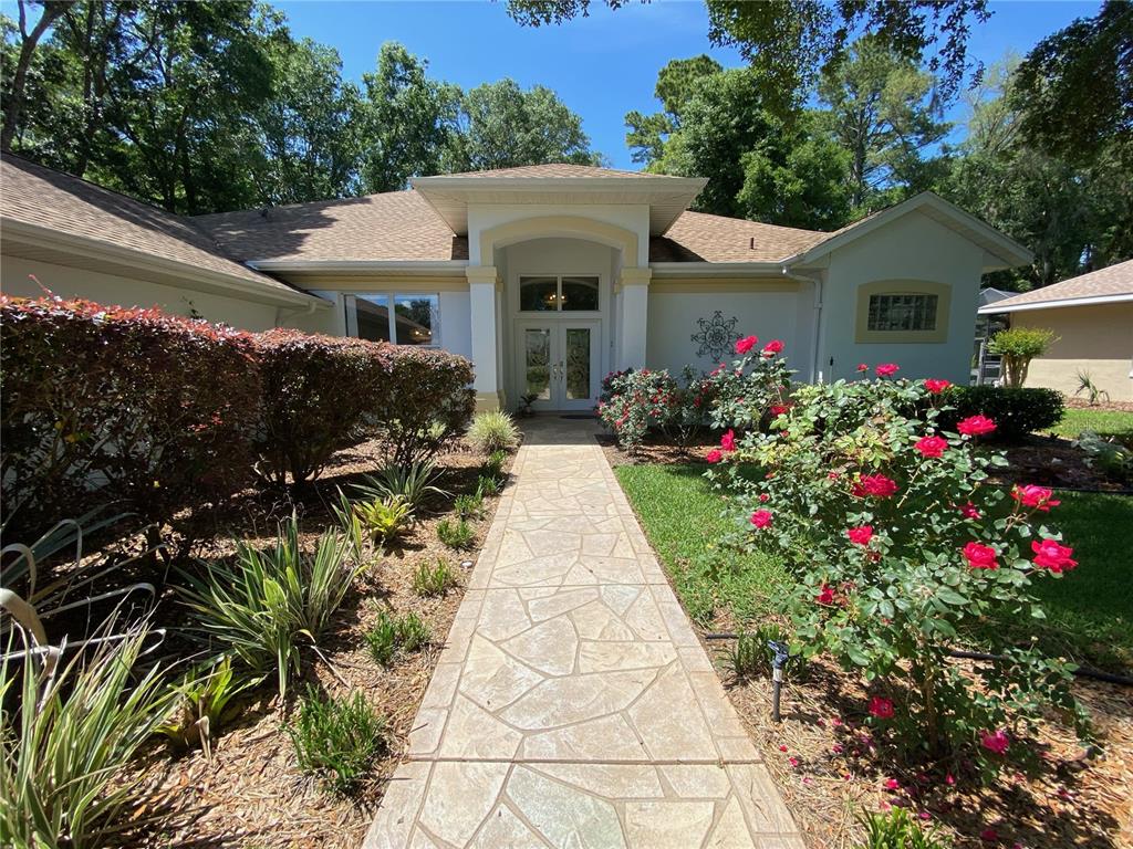 19243 Southwest 90th Ln Road Dunnellon, FL 34432 - Photo 1 of 1 Front entrance walkway