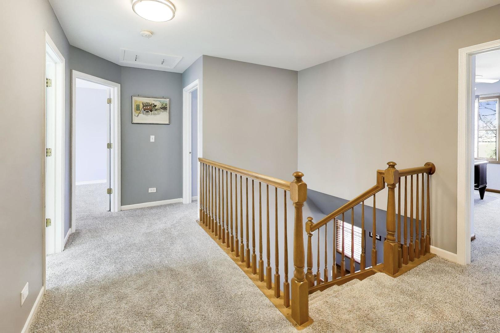 850 Tartans Drive West Dundee, IL 60118 - Photo 22 of 49 a view of a hallway with windows