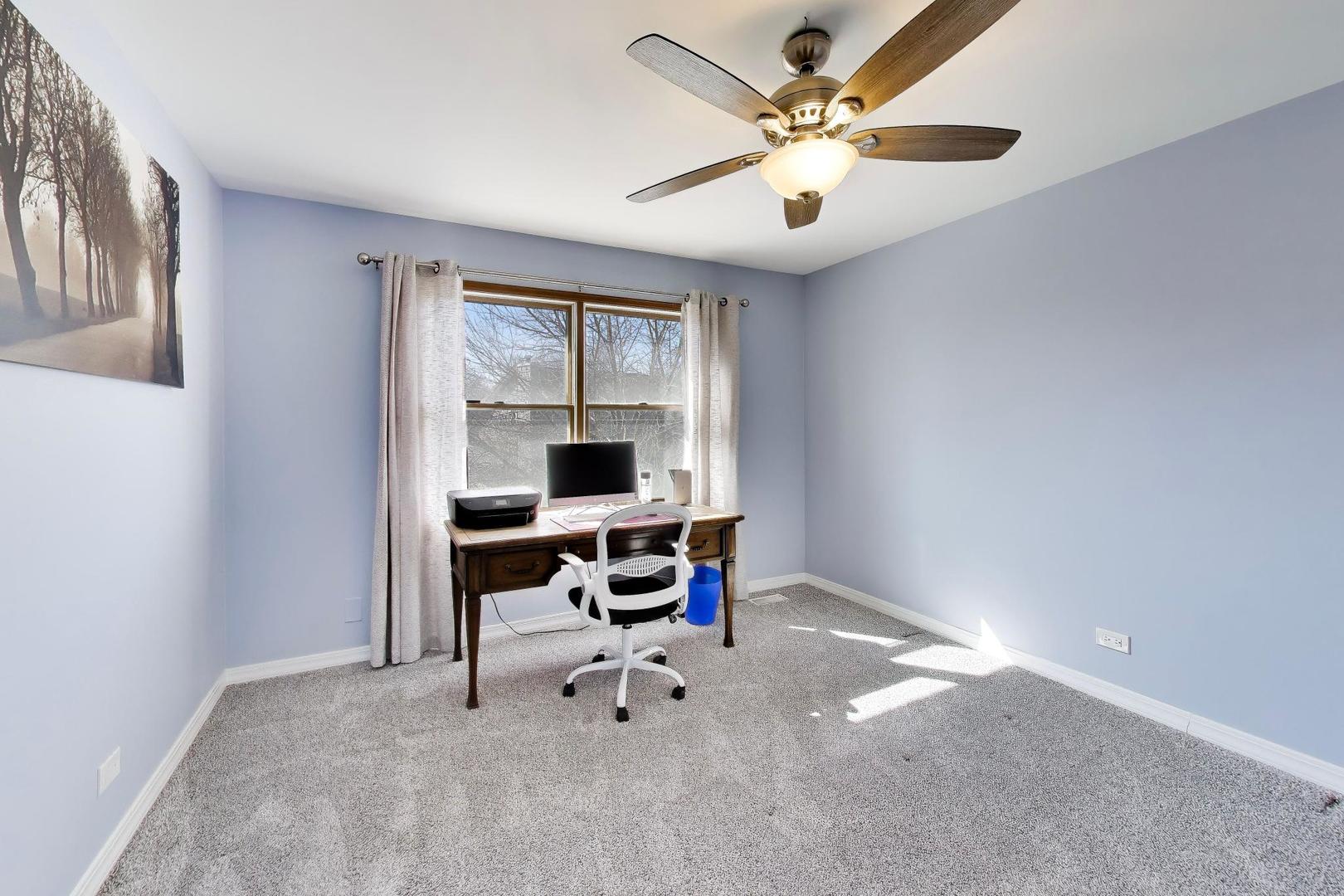 850 Tartans Drive West Dundee, IL 60118 - Photo 29 of 49 a workspace with chandelier
