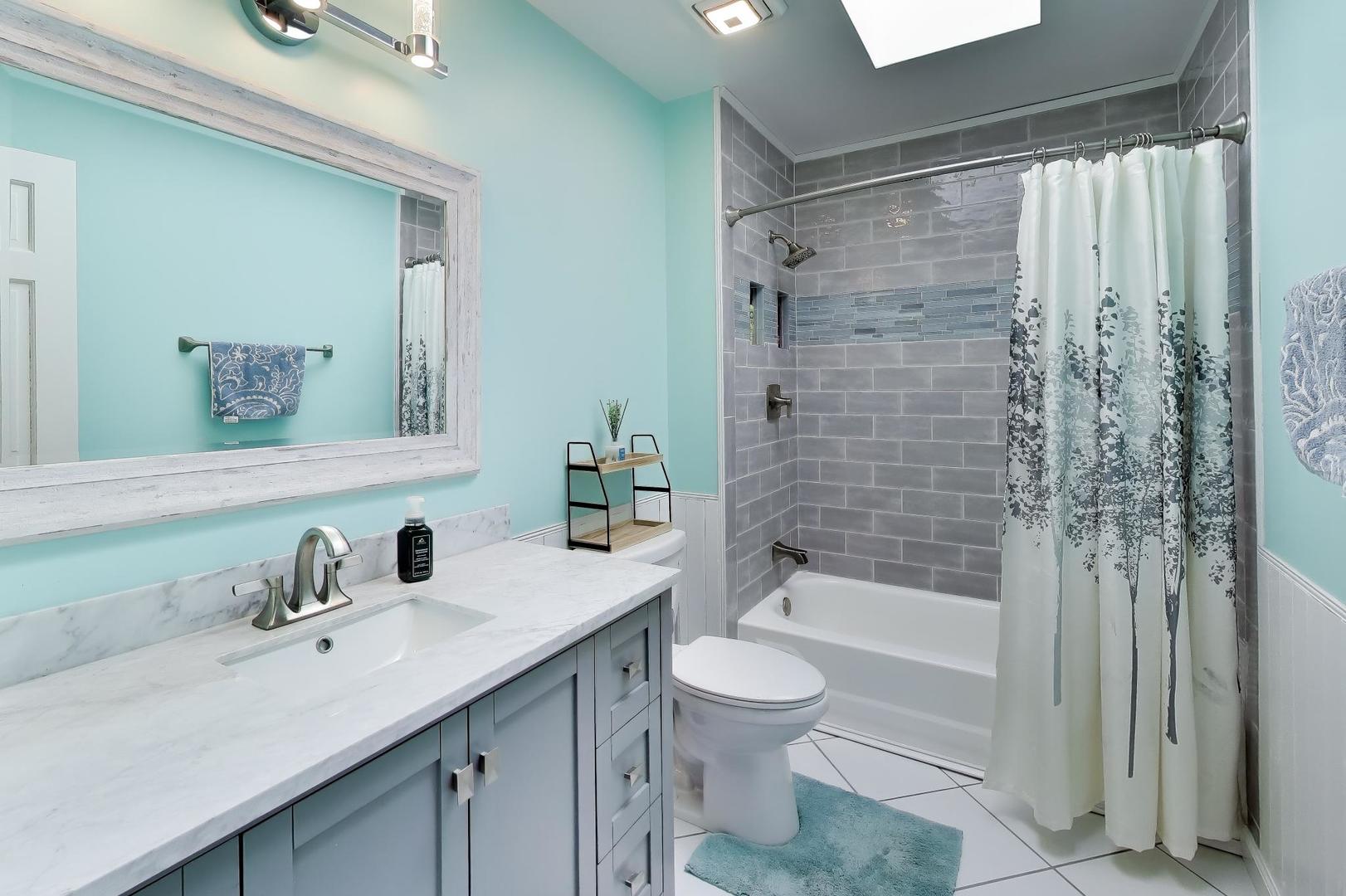 850 Tartans Drive West Dundee, IL 60118 - Photo 30 of 49 a bathroom with a sink toilet and shower