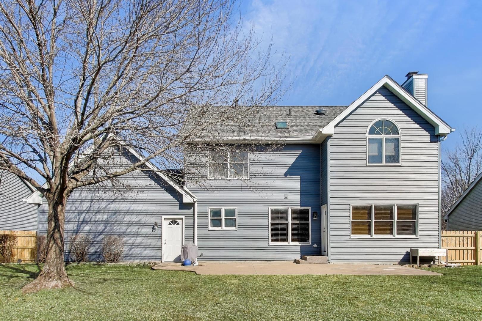 850 Tartans Drive West Dundee, IL 60118 - Photo 37 of 49 a view of a house with a yard