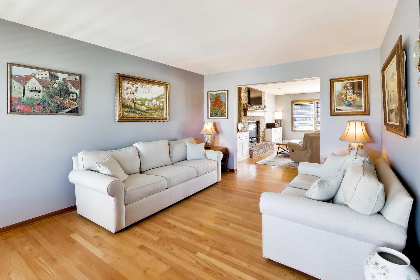 850 Tartans Drive West Dundee, IL 60118 - Photo 8 of 49 a living room with furniture and a wooden floor
