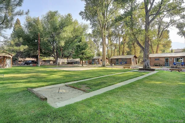 a view of a house with a big yard