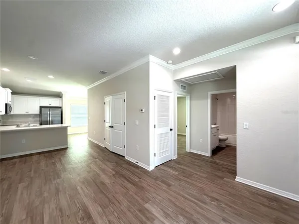 a view of kitchen with wooden floor