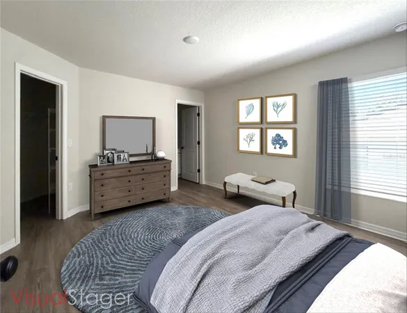 a bedroom with bed and a window