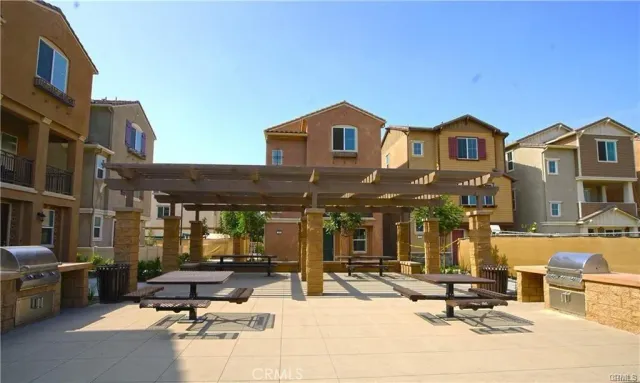 a view of chairs and tables in the patio