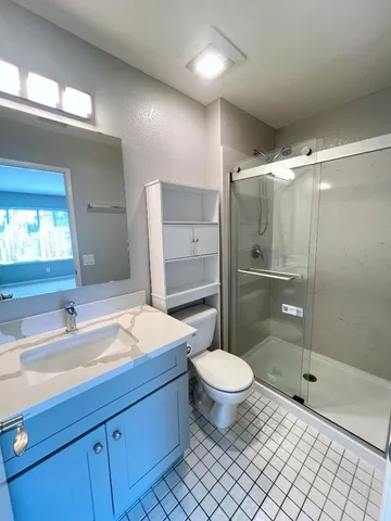 a bathroom with a toilet and a sink