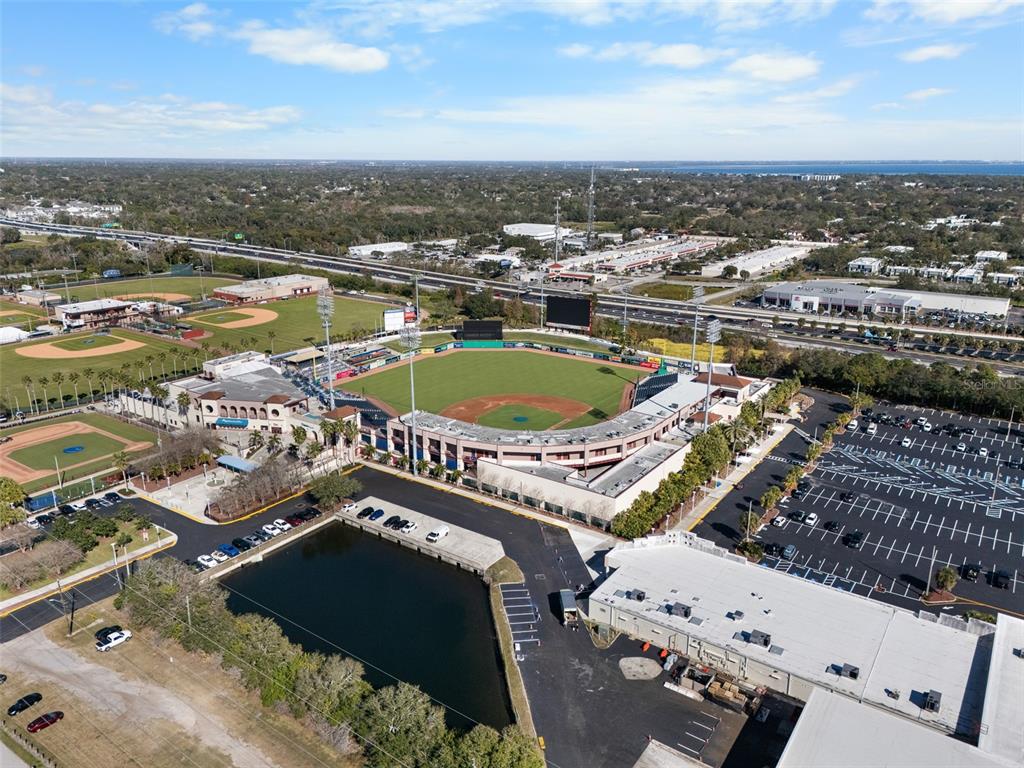 603 Ruskin Road Clearwater, FL 33765 - Photo 39 of 41 an aerial view of a house with a lake view