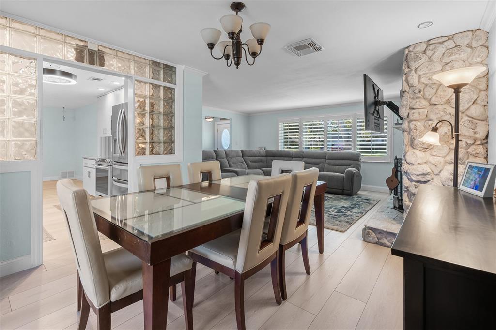 603 Ruskin Road Clearwater, FL 33765 - Photo 10 of 41 a view of a dining room with furniture