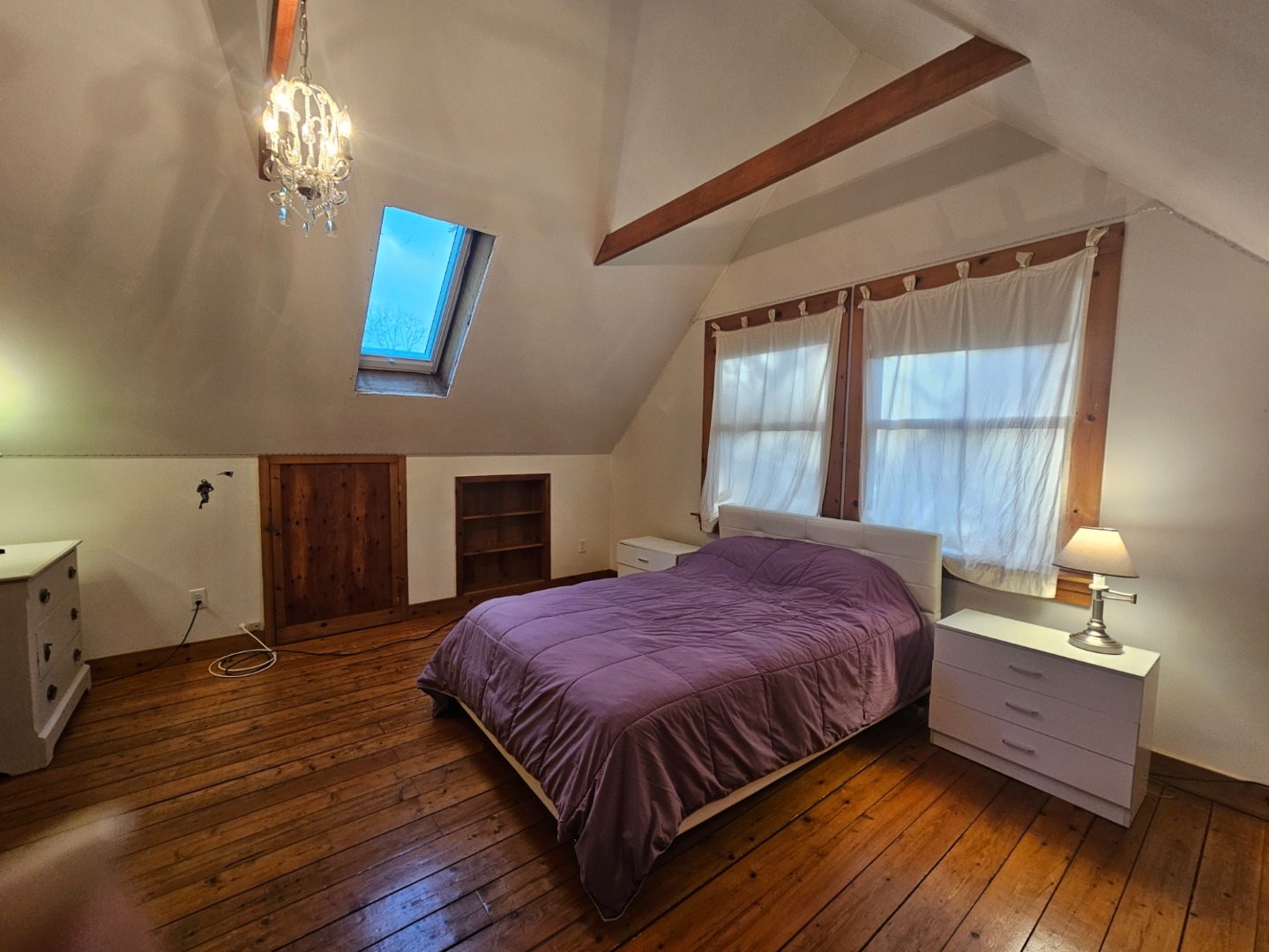 20 Leonard Circle Vineyard Haven, MA 02568 - Photo 11 of 16 a bed sitting in a bedroom next to a window