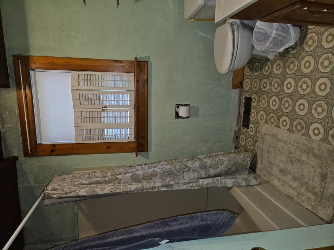 20 Leonard Circle Vineyard Haven, MA 02568 - Photo 7 of 16 a bathroom with a toilet and a shower