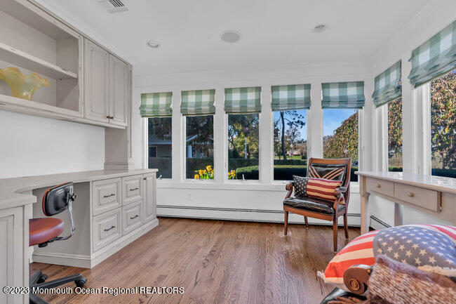 809 Lake Drive Spring Lake, NJ 07762 - Photo 13 of 34 a room with furniture and a wooden floor