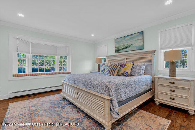 809 Lake Drive Spring Lake, NJ 07762 - Photo 15 of 34 a bedroom with a bed and window