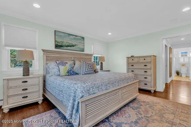 a bedroom with a bed and furniture