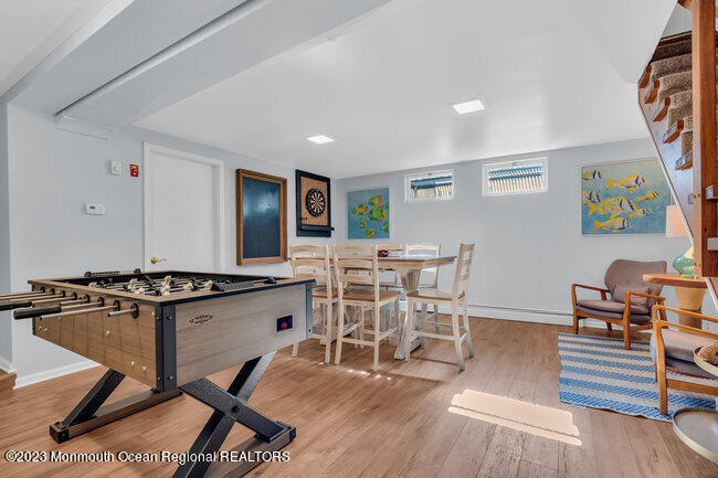 809 Lake Drive Spring Lake, NJ 07762 - Photo 20 of 34 a view of a dining room with furniture and wooden floor