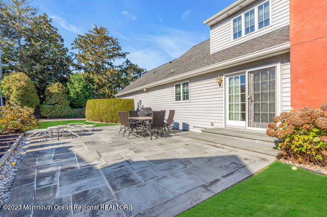 809 Lake Drive Spring Lake, NJ 07762 - Photo 29 of 34 a view of a house with backyard and sitting area