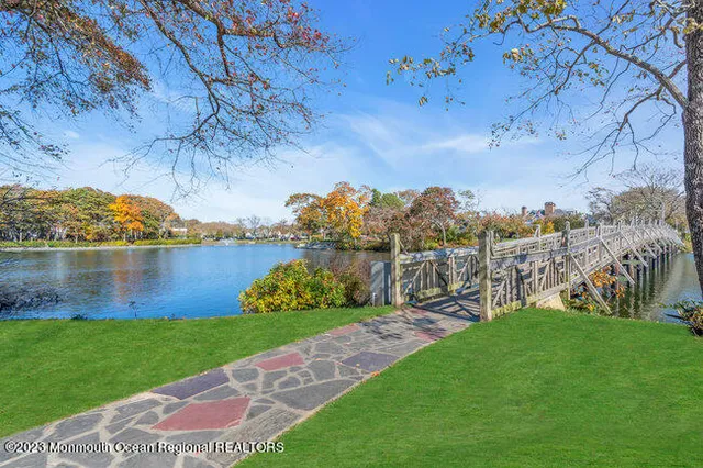 a view of a lake with a big yard