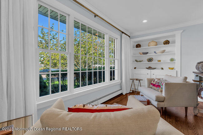 809 Lake Drive Spring Lake, NJ 07762 - Photo 5 of 34 a living room with a large window