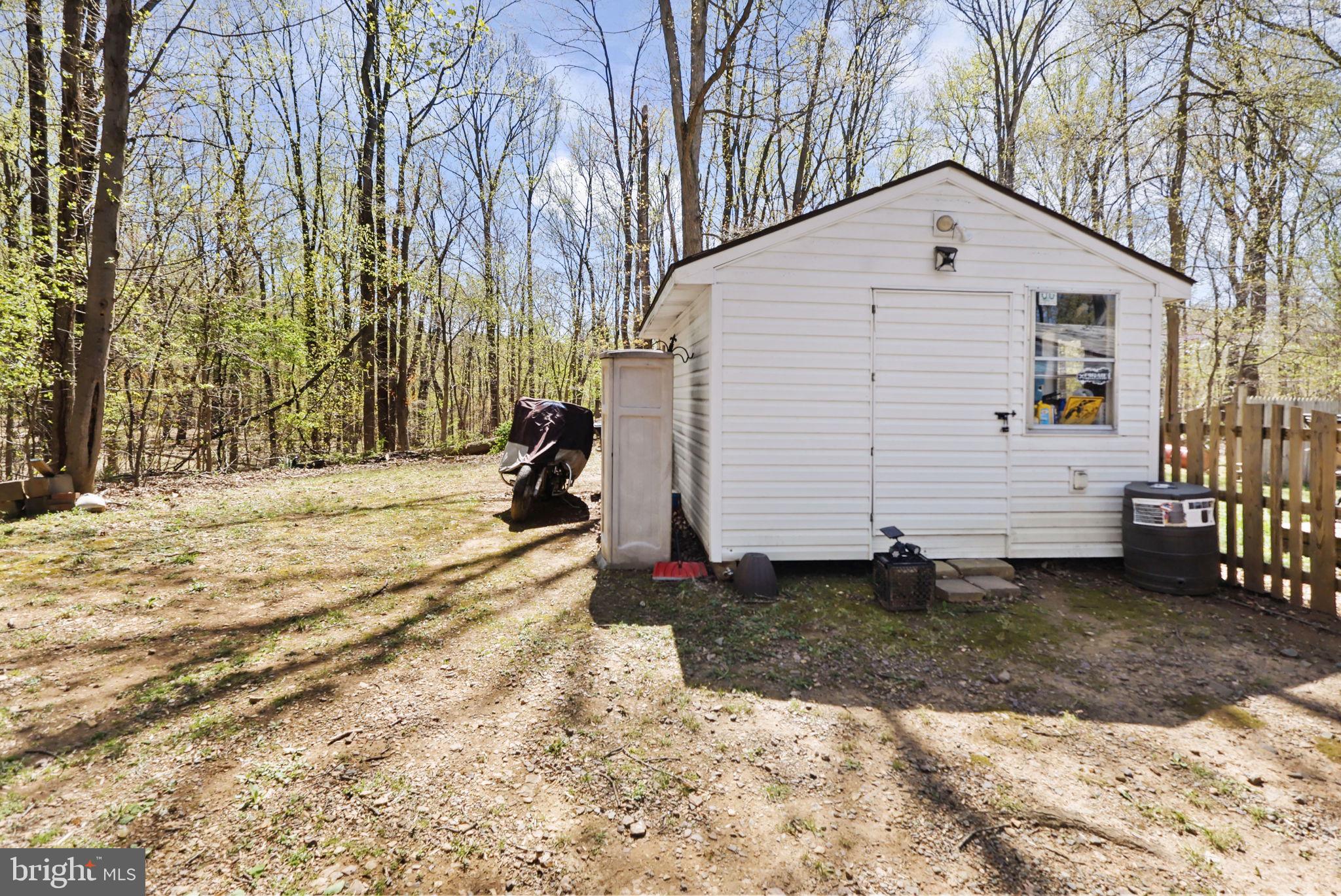 479 Hemlock Lane Bluemont, VA 20135 - Photo 15 of 17 a view of a house with a yard