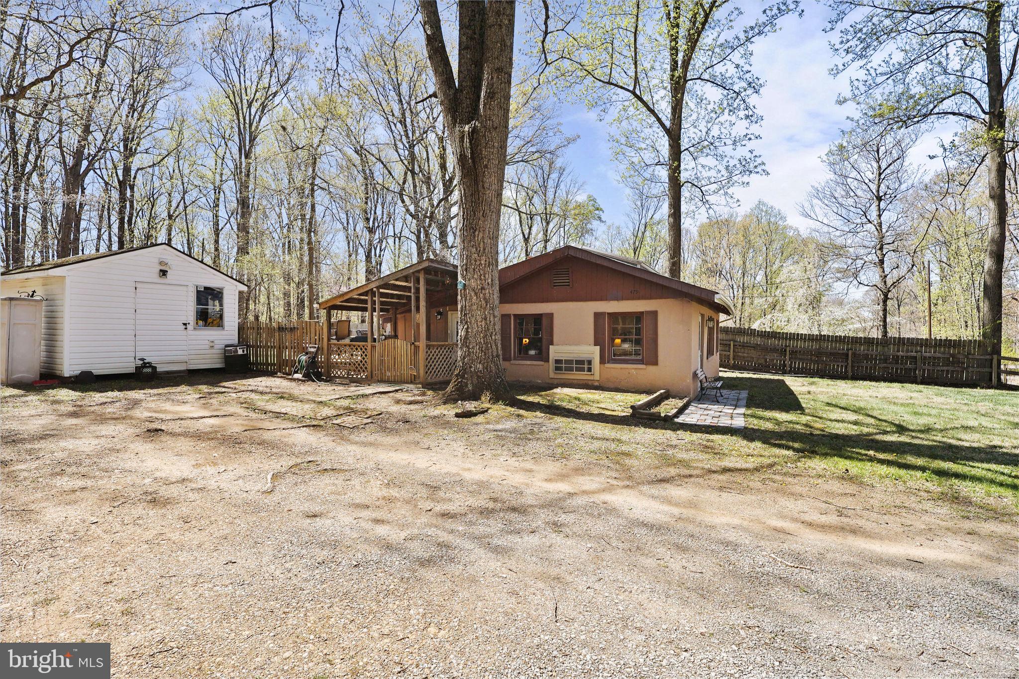 479 Hemlock Lane Bluemont, VA 20135 - Photo 3 of 17 a view of a house with a yard covered in snow