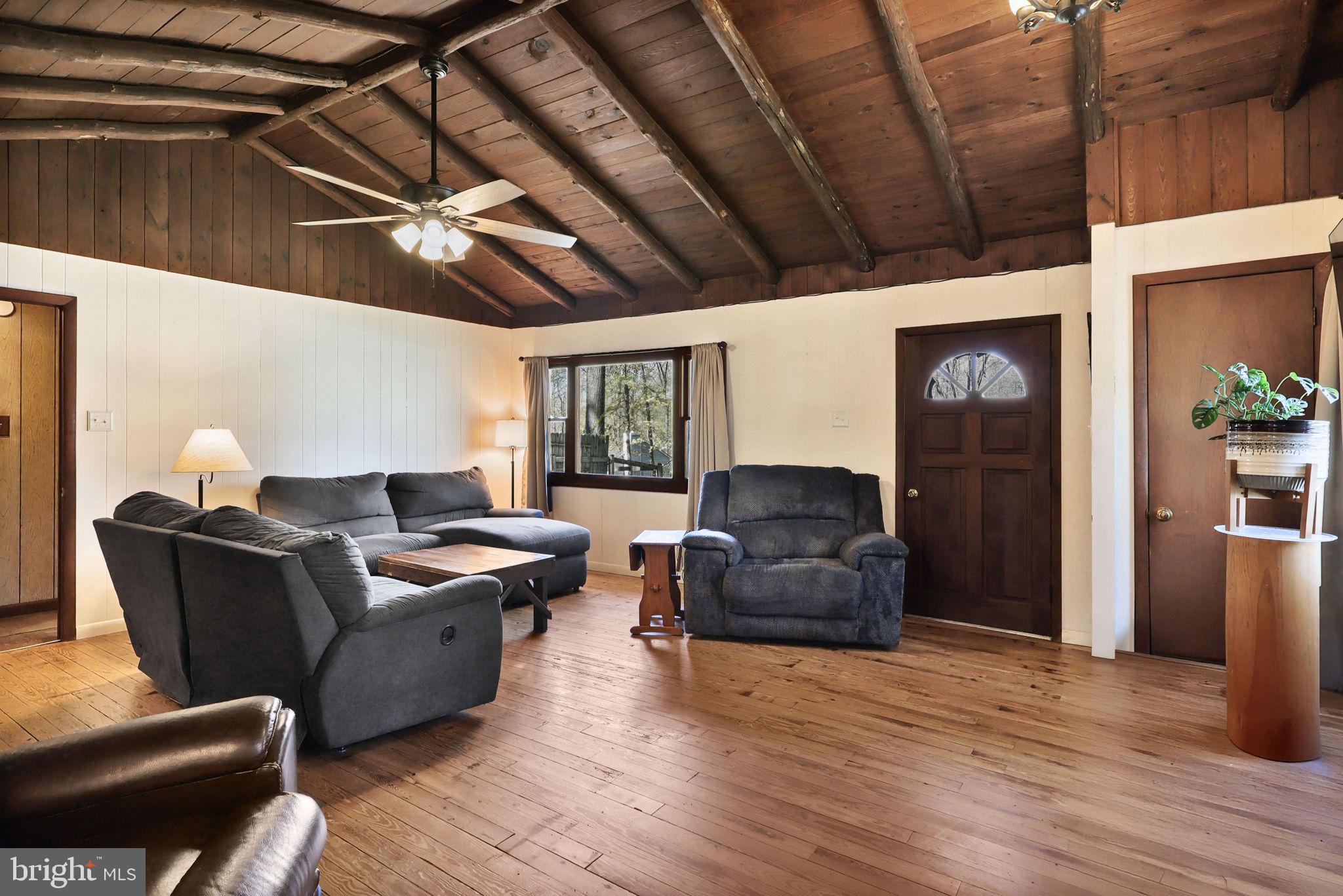 479 Hemlock Lane Bluemont, VA 20135 - Photo 5 of 17 a living room with furniture and a wooden floor