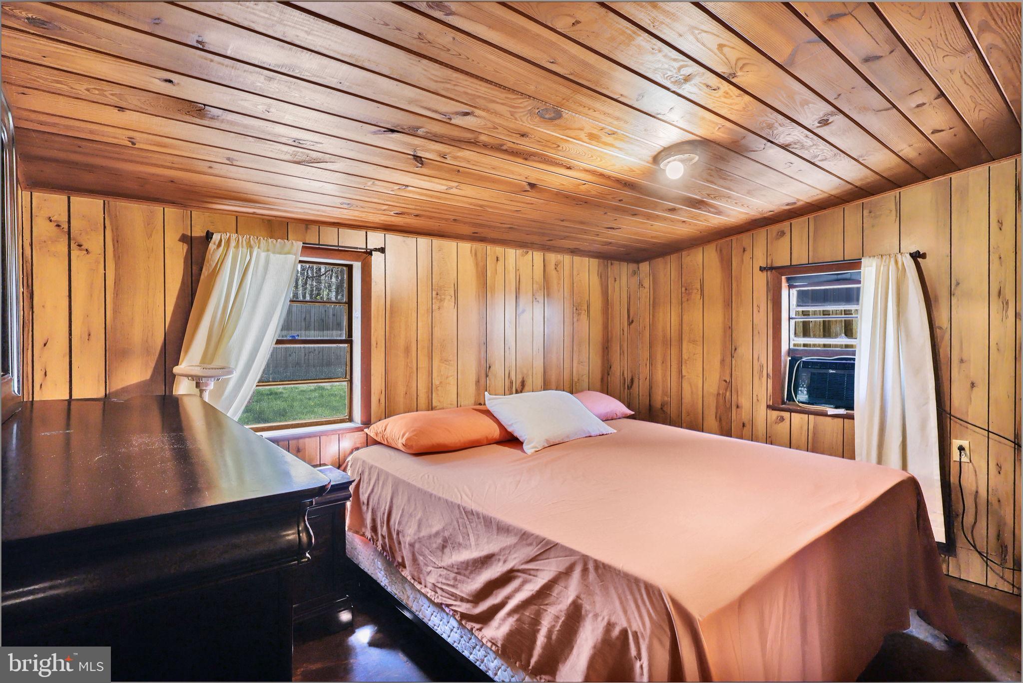 479 Hemlock Lane Bluemont, VA 20135 - Photo 10 of 17 a bedroom with a bed and a window