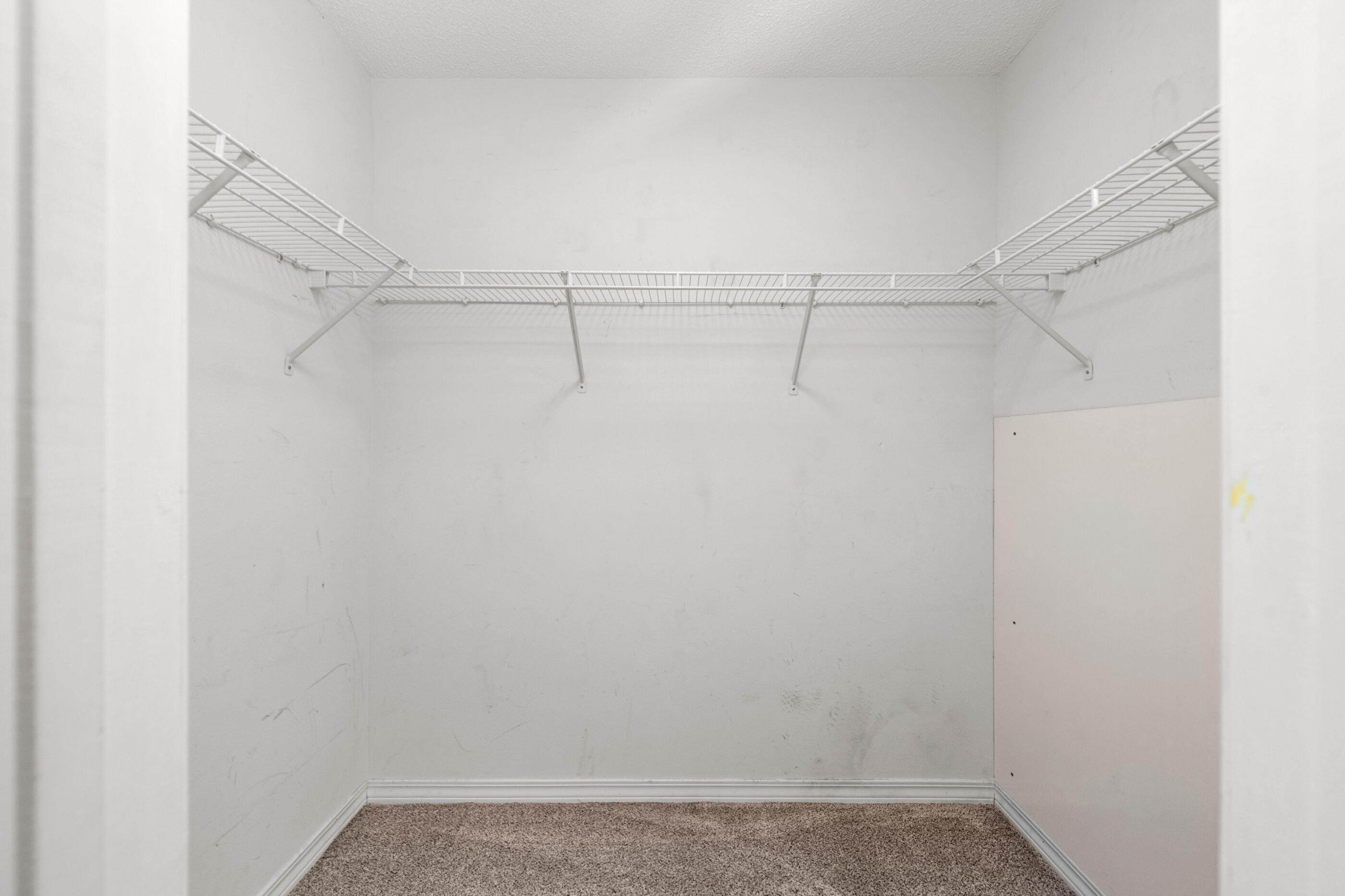 1810 Pointed Leaf Lane Fort Walton Beach, FL 32547 - Photo 15 of 24 a view of a room with racks on the wall