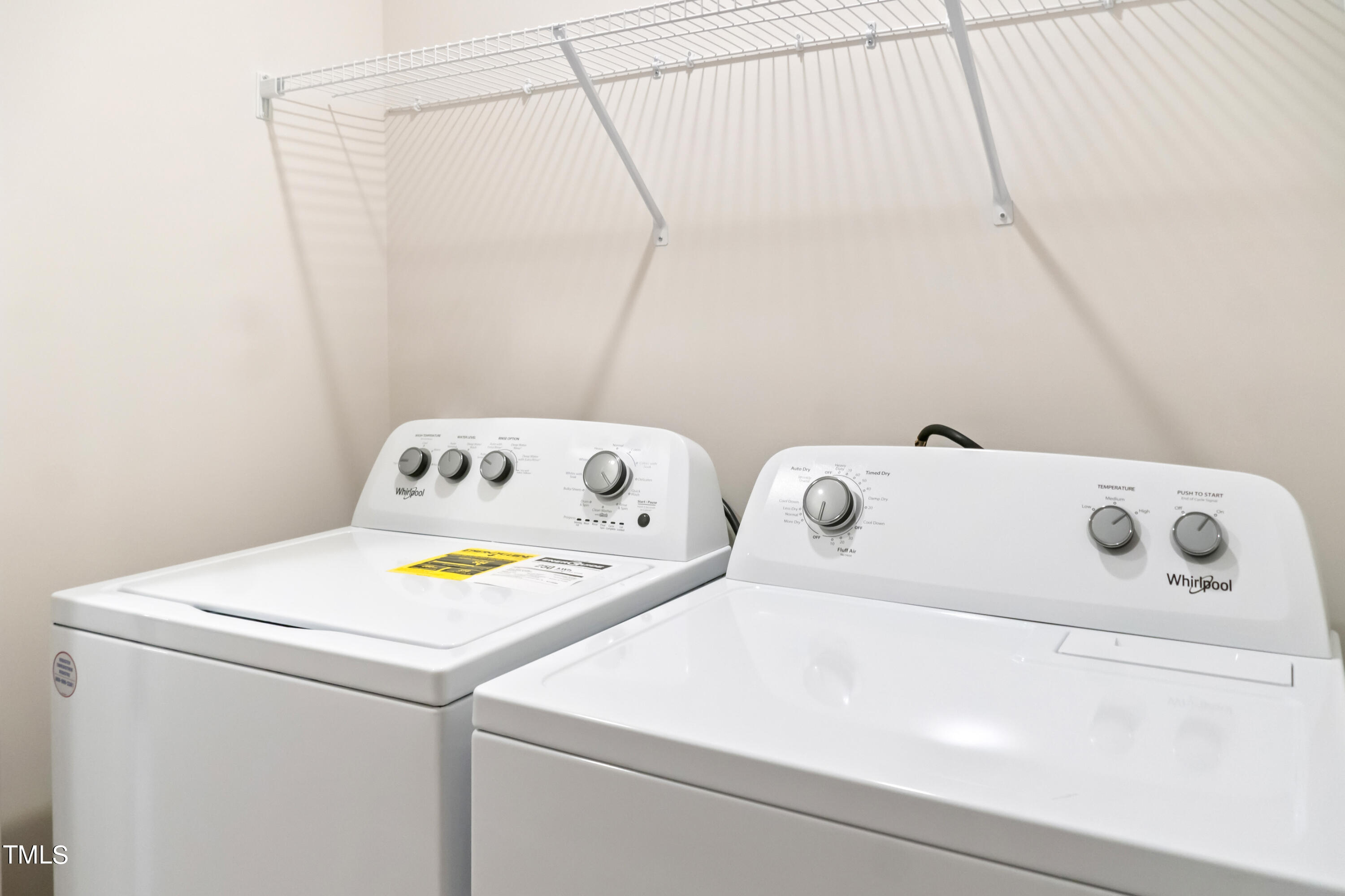 4911 Caddis Bend Raleigh, NC 27604 - Photo 20 of 30 a utility room with dryer and washer