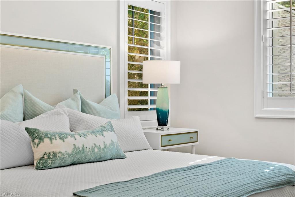 810 9th Street South Naples, FL 34102 - Photo 14 of 32 a living room with furniture and a window