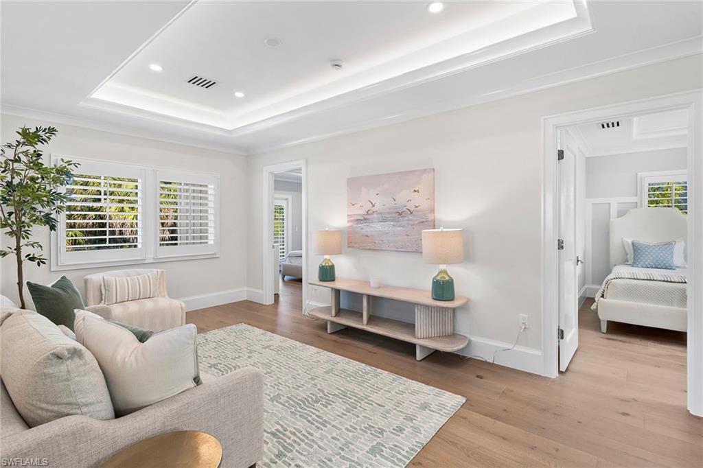 810 9th Street South Naples, FL 34102 - Photo 16 of 32 a living room with furniture and a couch