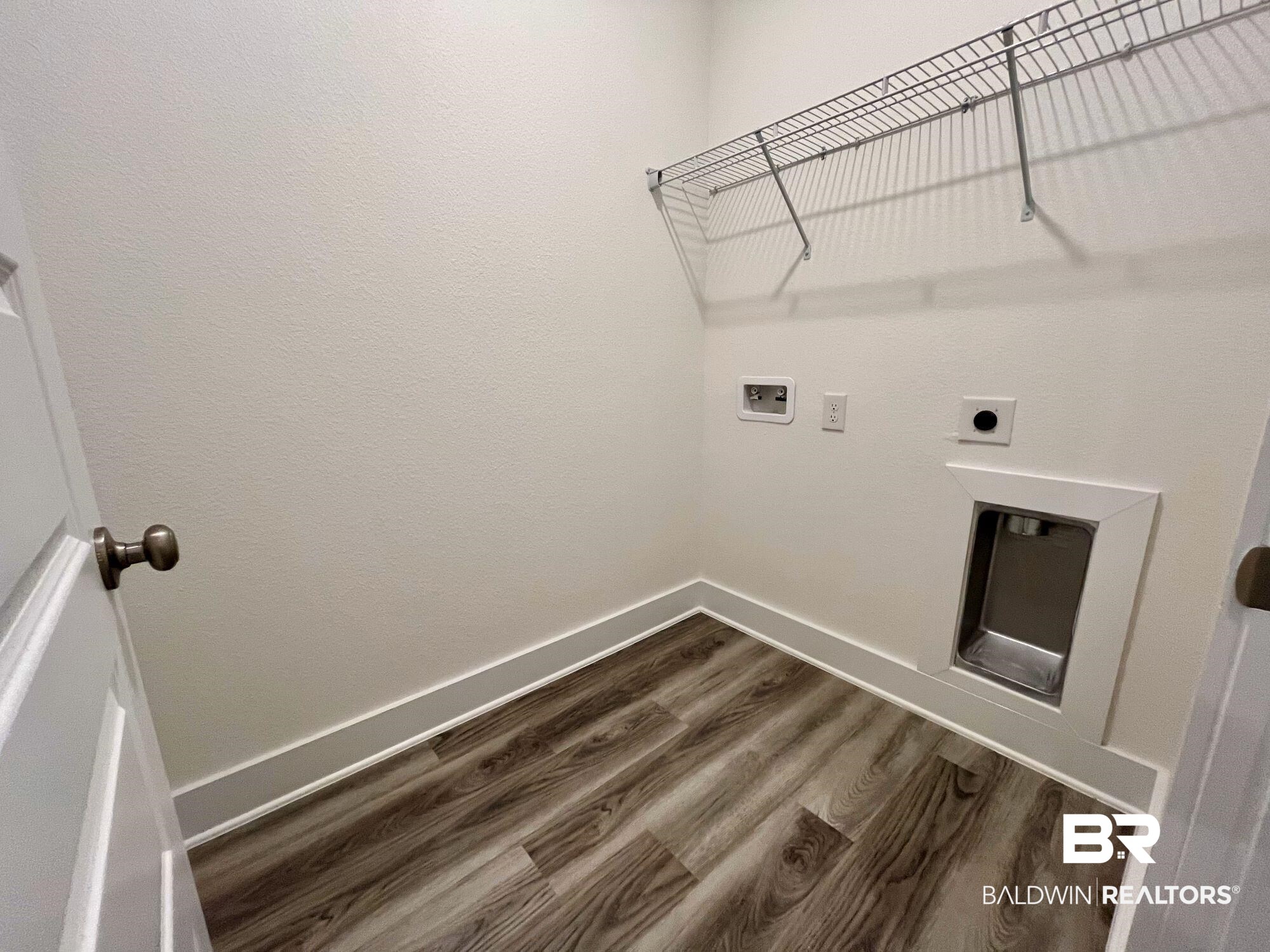 334 Barndling Street Fairhope, AL 36532 - Photo 23 of 34 Clothes washing area featuring hardwood / wood-style flooring, hookup for a washing machine, and electric dryer hookup