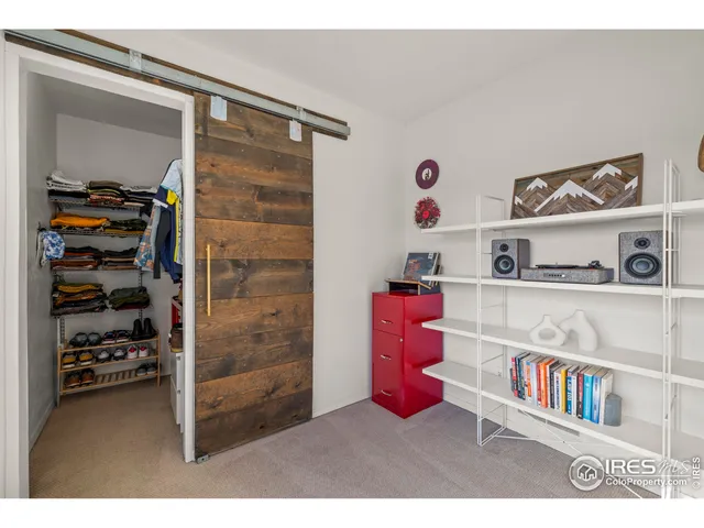 a bathroom with a sink a mirror a toilet and a mirror