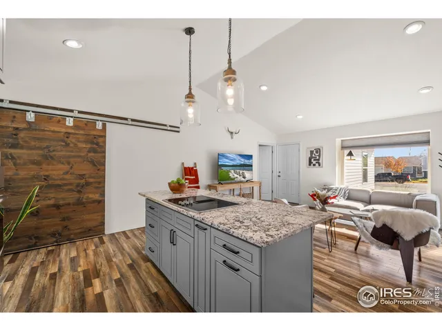 a kitchen with a table and chairs in it