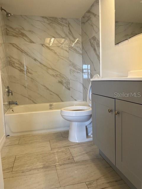 7034 Coral Reef Drive Port Richey, FL 34668 - Photo 2 of 9 a bathroom with a toilet and a shower