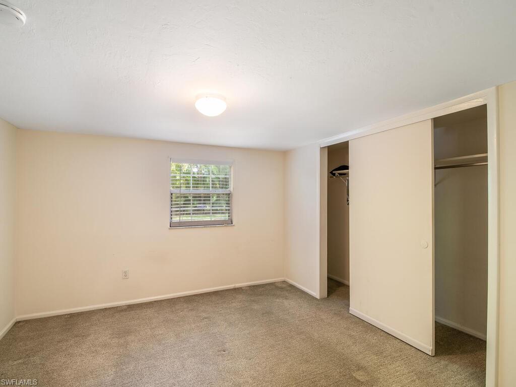 285 Porter Street Naples, FL 34113 - Photo 16 of 31 285 - Downstairs - Bed
