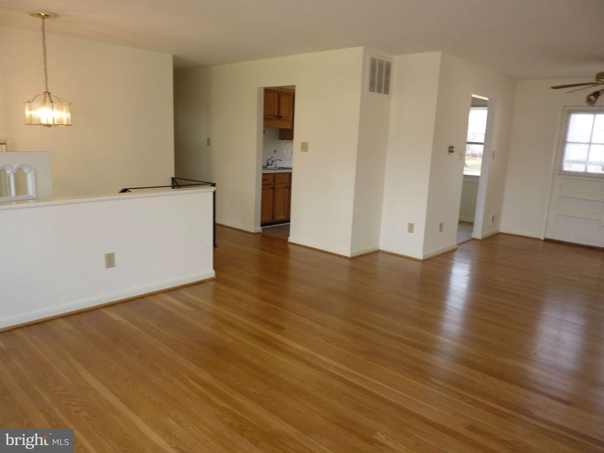 1133 Loxford Terrace Silver Spring, MD 20901 - Photo 9 of 30 Living Room - With Partial View of DR